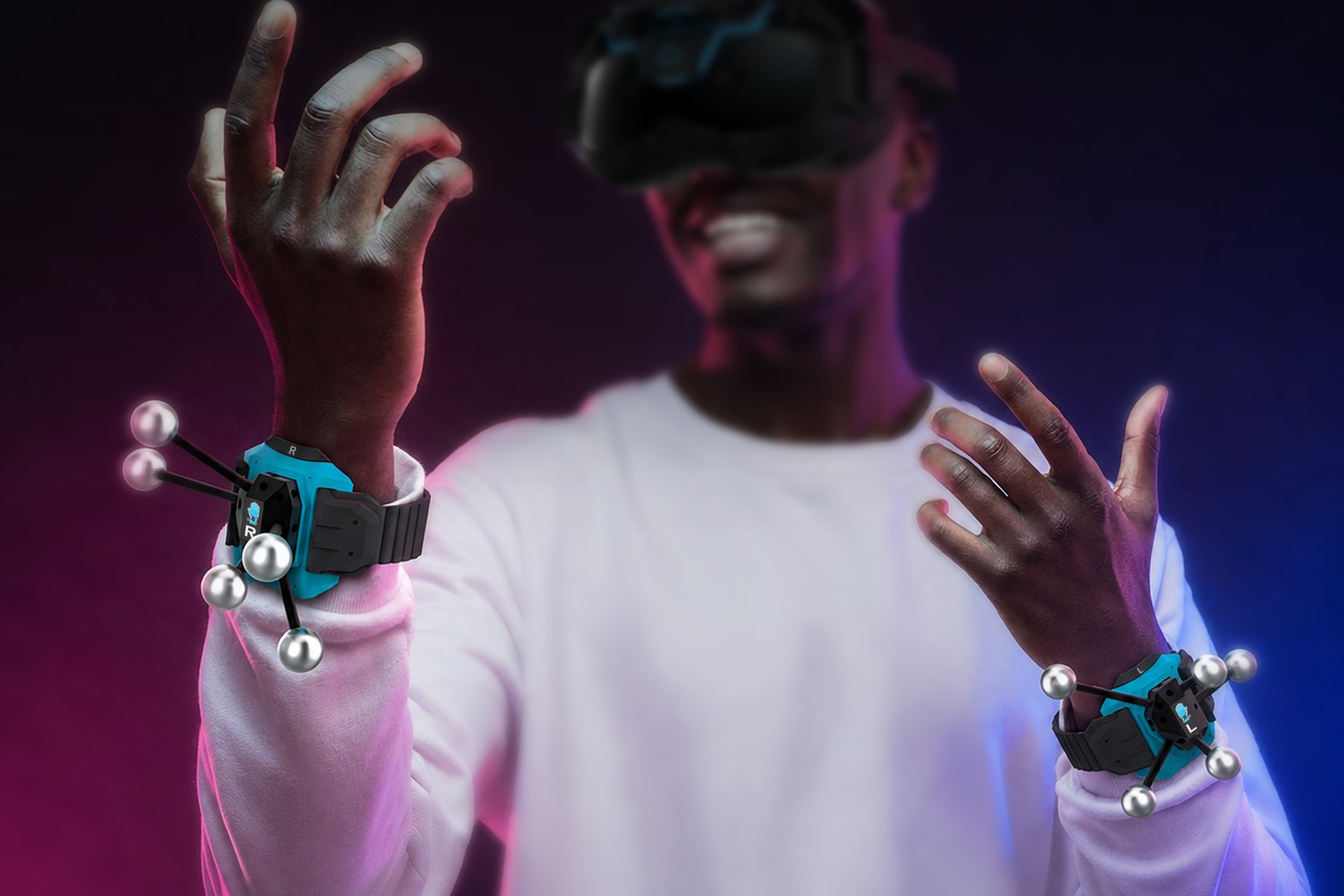 Player wearing Sandbox VR limb trackers on both wrists