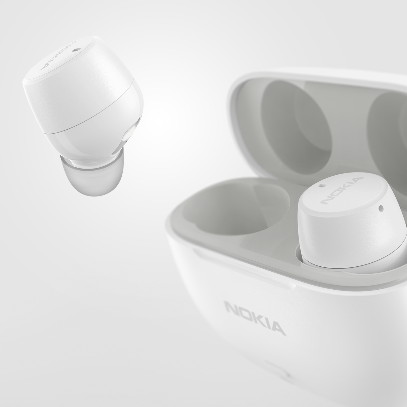 Black and white charging cases among stones